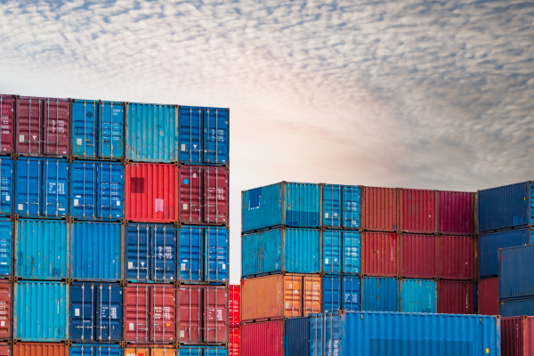red and blue stacked shipping containers. 